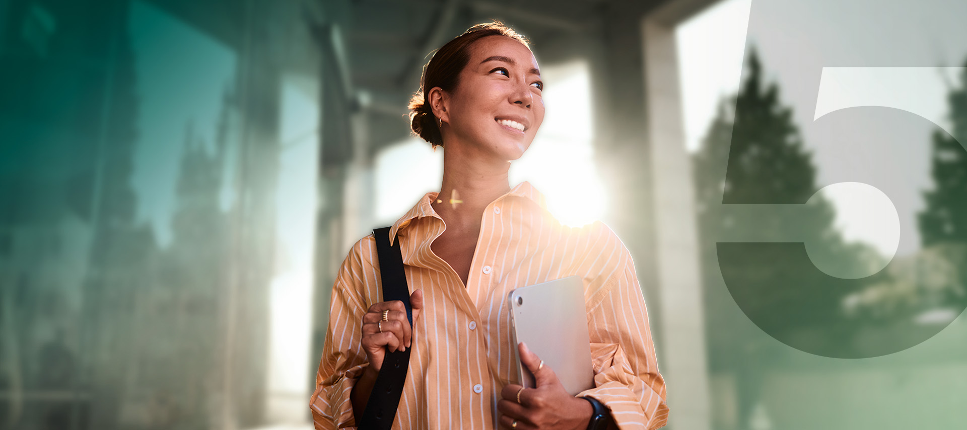 Woman with shoulder bag and laptop