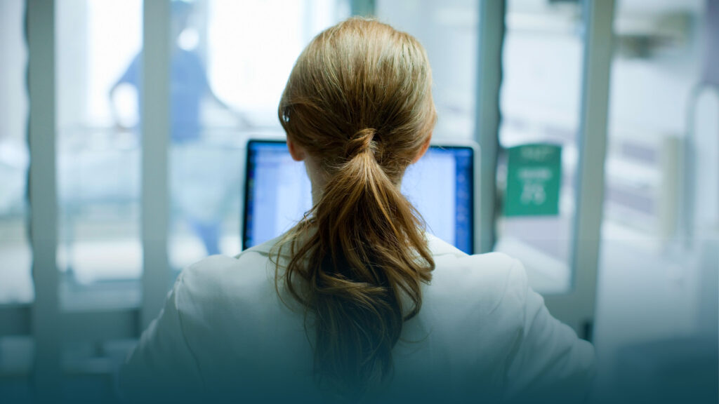 Woman looking at a computer screen